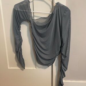 Asymmetrical Neck Sheer Mesh Top

Would be super cute over a black top!